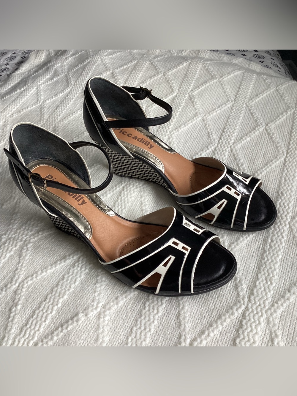 Piccadilly patent leather wedge heels made in Brasil. Size US 7
